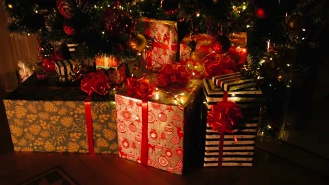 Christmas gift under decorated with light tree Stock Footage 220685082