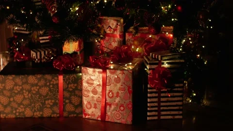 Christmas gift under decorated with light tree Stock Footage 220833007