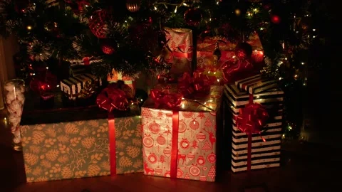 Christmas gift under decorated with light tree Stock Footage 228919639