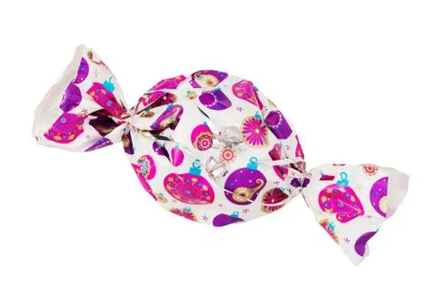Christmas gift wrapped in a candy shape Stock Photos