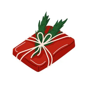 Christmas gift wrapped in red with a string bow and pine leaves decoration in Stock Illustration