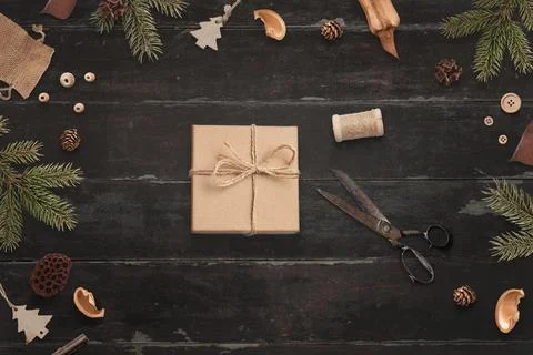 Christmas gift wrapping. Rustic composition. Top view, flat lay of wooden tab Stock Photos