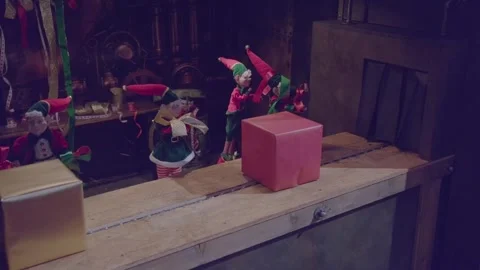 Christmas gifts passing by in a elf workshop in Schilliger in Gland Stock Footage 293480444