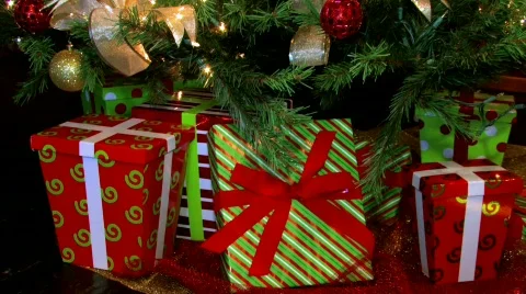 Christmas gifts under a Christmas tree. Stock Footage