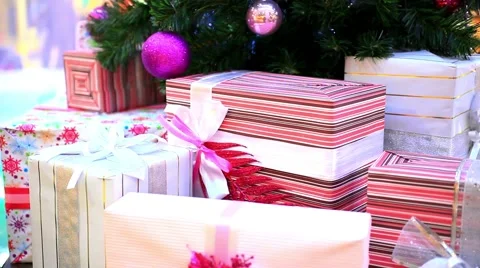 Christmas gifts under tree. Shift motion with change focus on blurred. HD. Stock Footage 44986288