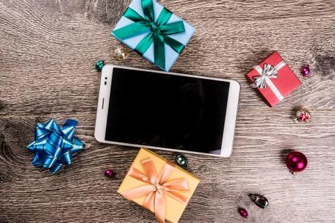 Christmas gifts on wood Stock Photos