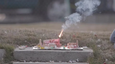 A Christmas ginger bread and graham cracker decoration has a large fire Video stock 140737280