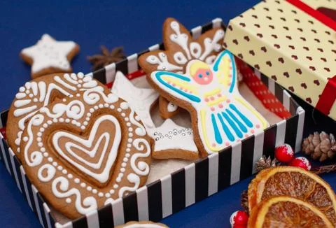 Christmas gingerbread handmade decorated with patterns and covered with icing Stock Photos