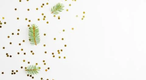 Christmas gold flat lay, composition of confetti and branches Stock Photos