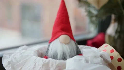 Christmas gonk in gift box on window sill at home Vídeos de archivo 168362463