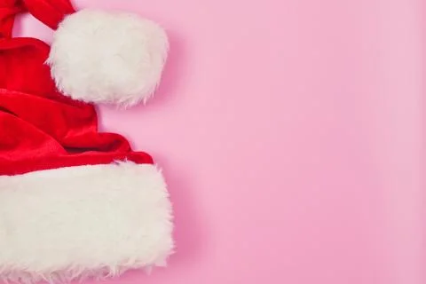 Christmas hat on a pink background isolate, copyspace, layout Stock Photos