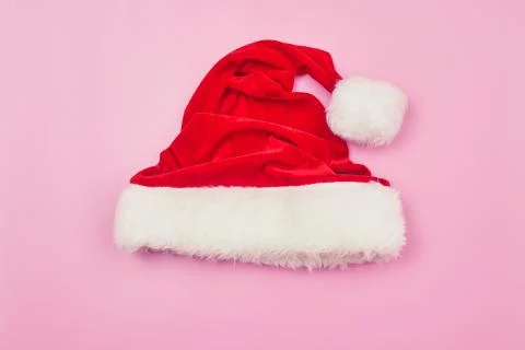 Christmas hat on a pink background isolate, copyspace, layout Stock Photos
