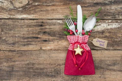 Christmas holiday background with table setting and decoration on wood Stock Photos