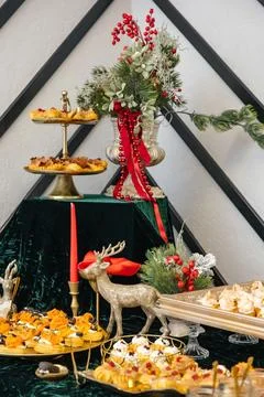 Christmas holiday buffet table with festive decorations Stock Photos