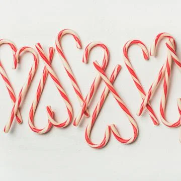 Christmas holiday candy cane pattern, texture and background, square crop Stock Photos