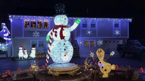 Christmas holiday flashing lights snowma... | Stock Video | Pond5