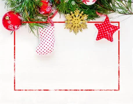 Christmas holiday frame. Red white golden Christmas toys, green branch Stock Photos