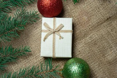 Christmas holidays composition with gift boxes, toys, coniferous tree branch. Foto stock