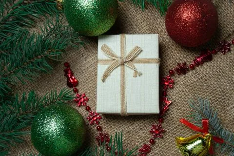 Christmas holidays composition with gift boxes, toys, coniferous tree branch. Foto stock