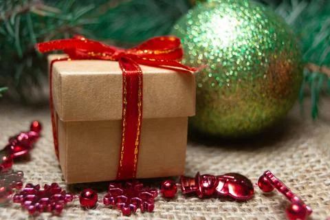 Christmas holidays composition with gift boxes, toys and coniferous tree bran Stock-Fotos