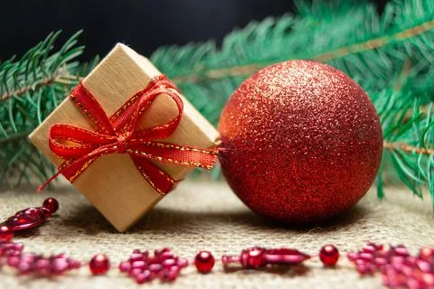 Christmas holidays composition with gift boxes, toys, coniferous tree branch. Foto stock