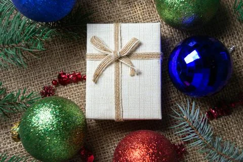 Christmas holidays composition with gift boxes, toys, coniferous tree branch. Stock-Fotos