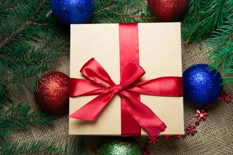 Christmas holidays composition with gift boxes, toys, coniferous tree branch. Foto stock