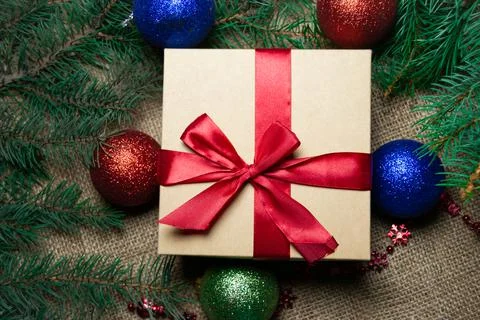 Christmas holidays composition with gift boxes, toys, coniferous tree branch. Stock-Fotos