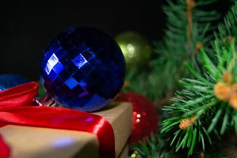 Christmas holidays composition with gift boxes, toys, coniferous tree branch. Foto stock