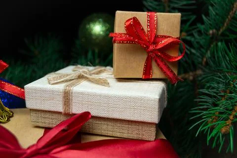 Christmas holidays composition with gift boxes, coniferous tree branch. Happy Stock-Fotos