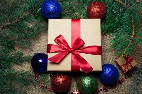 Christmas holidays composition with gift boxes, toys, coniferous tree branch. Foto stock