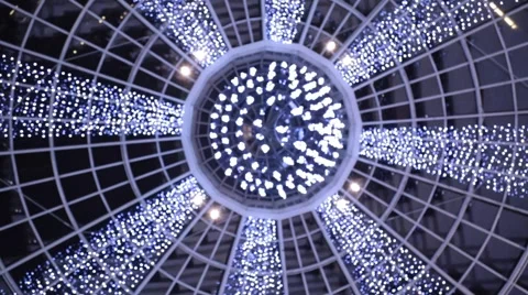 Christmas illumination on ceiling, circle with rays Stock Footage 57787354