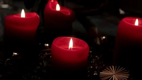 Christmas installation with red burning decorative candles on wreath of fir-tree Stock Footage 74475946