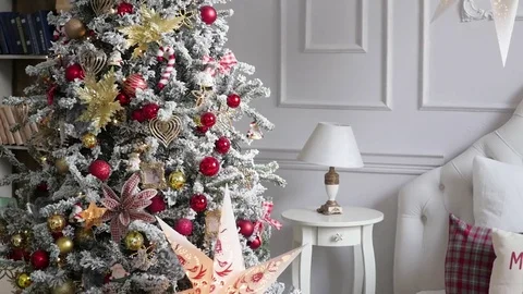 Christmas interior in the studio. large plan. Bed and Christmas tree Stock-Footage 85230781