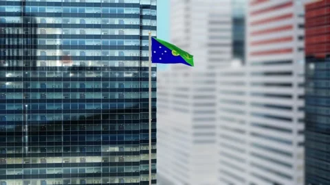 Christmas Island Flag 3D Render Animation on Pole with Modern City Buildings Video stock 333072894