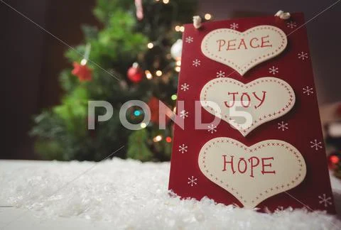 Christmas Label With Massages Of Peace, Joy And Hope