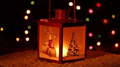 Christmas lantern with candle shining in the darkness, looping Stock Footage 74855662
