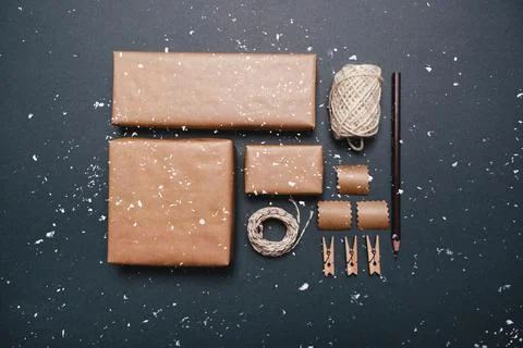 Christmas layout ecological packaging on a grey background Stock Photos