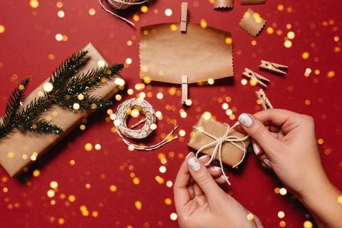 Christmas layout ecological packaging on a red background Stock Photos