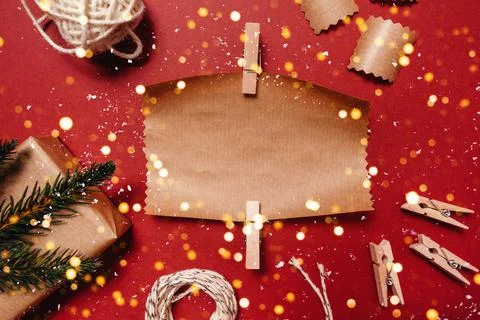 Christmas layout ecological packaging on a red background Stock Photos