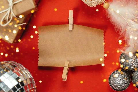 Christmas layout ecological packaging on a red background Stock Photos