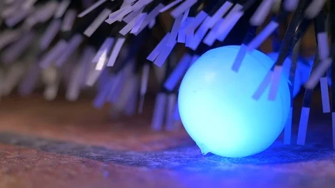 Christmas light ball on the fireplace macro shoot Video stock 82704347