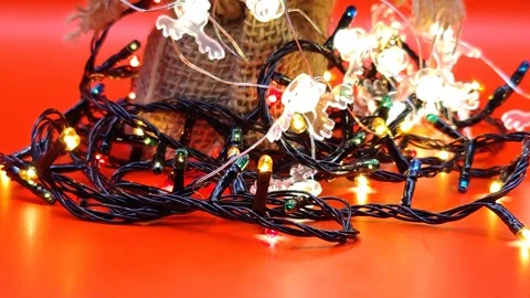 Christmas light bright red background close-up Stock Footage 322677188