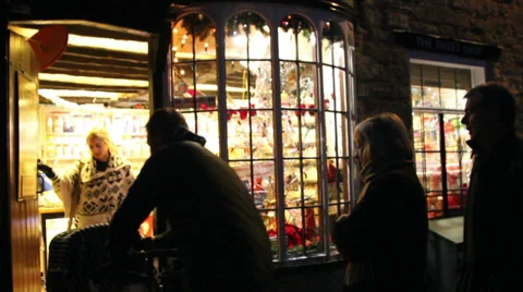 Christmas lights enter shop Stock Footage 33843483