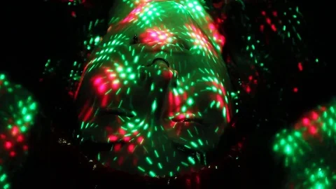 Christmas lights on the face Stock Footage 80072504