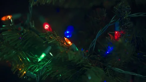 Christmas Lights Flickering on a Tree in 4k Stock Footage 98960490