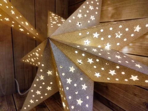 Christmas lights in the form of three-dimensional stars Stock Photos