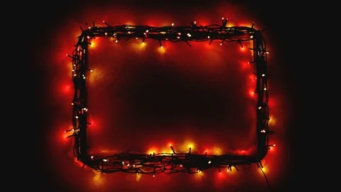 Christmas lights frame on snow background Stock Footage 99179464