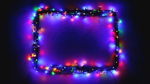 Christmas lights frame on snow background Stock Footage 99180673