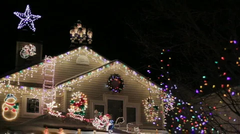 Christmas Lights On A House Exterior At Night Stock Footage